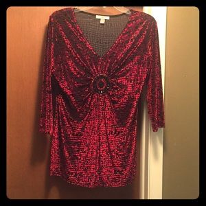 Soft quarter length sleeve top. Gently worn.